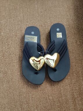 Women’s Black Flip Flop Sandals with Gold Heart Accent